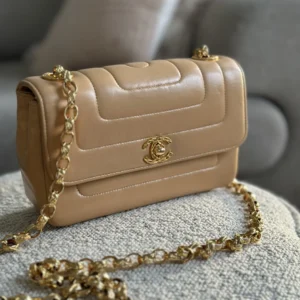 Chanel classic flap bag beige quilted logo